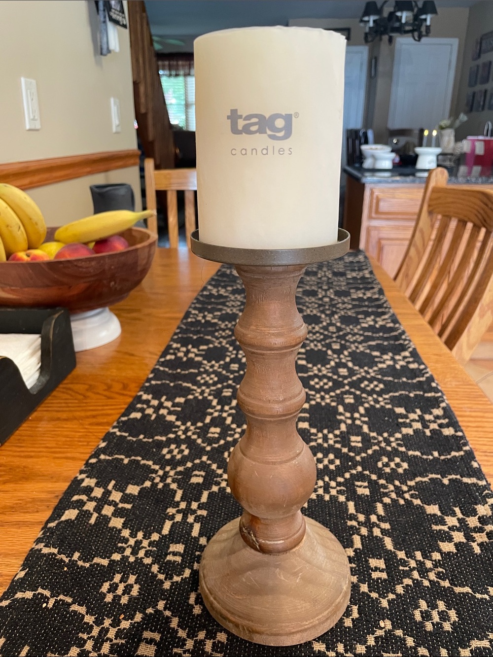 Tag Ivory Candle on Brown Wooden Holder